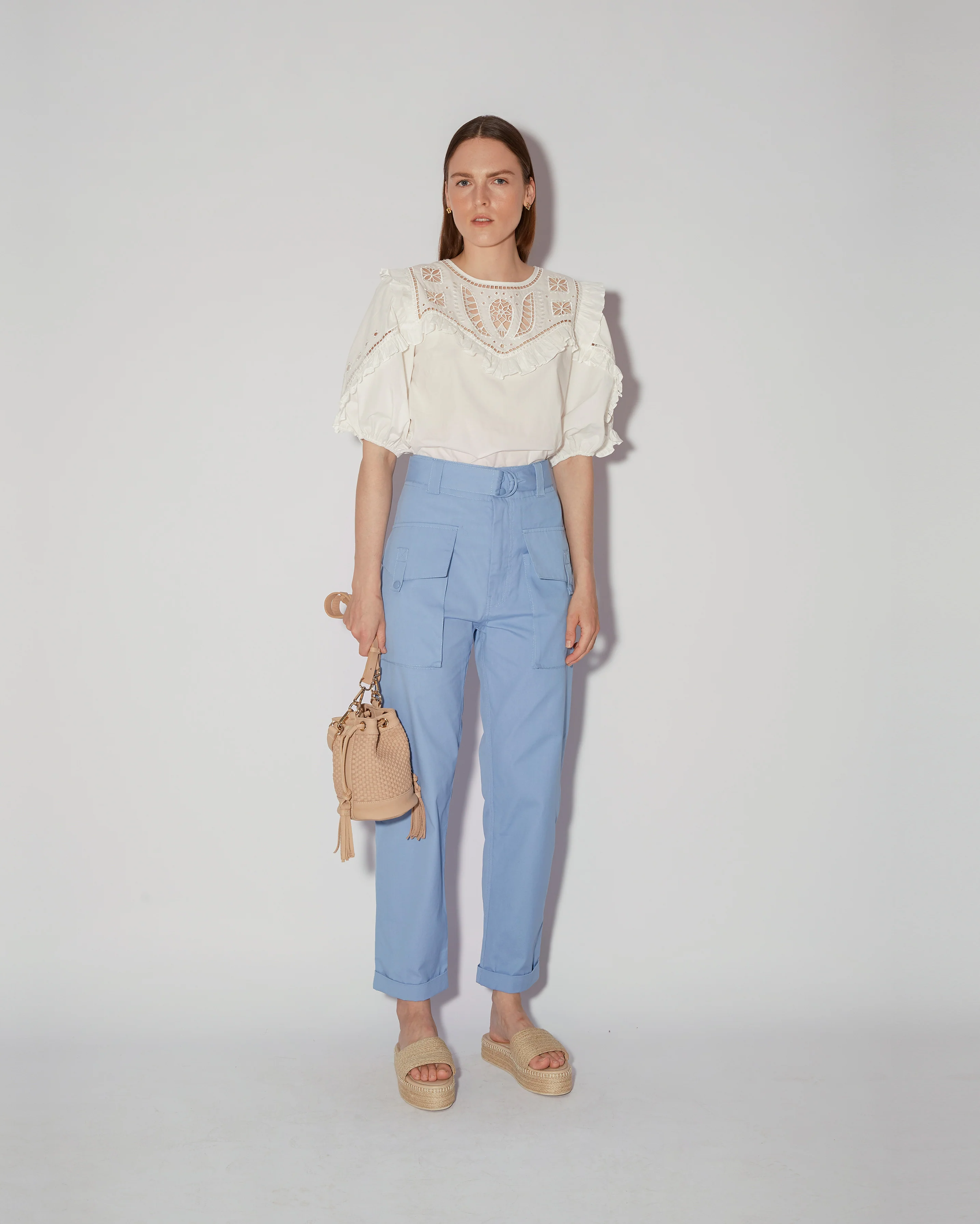Elegant White Embroidered Blouse With Ruffled Details